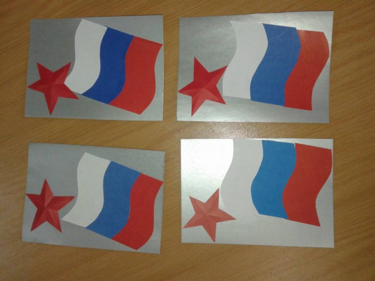 Зірка оформлена в 3D, а на російський прапор, як ніби дме лютневий вітер